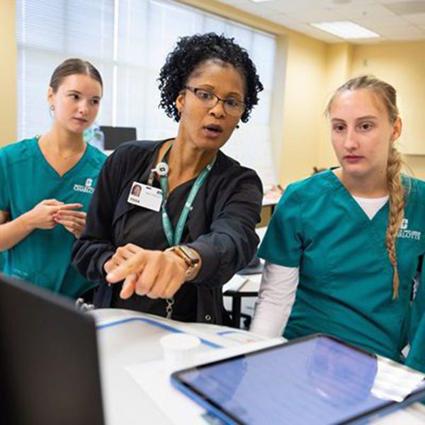 Head nurse teaching nursing students